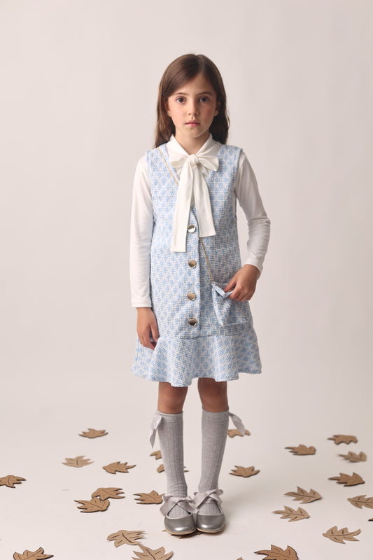 Jumper azul con moño blanco y textura tweed